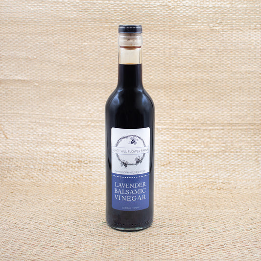 Lavender infused dark balsamic vinegar glass bottle with screw cap.